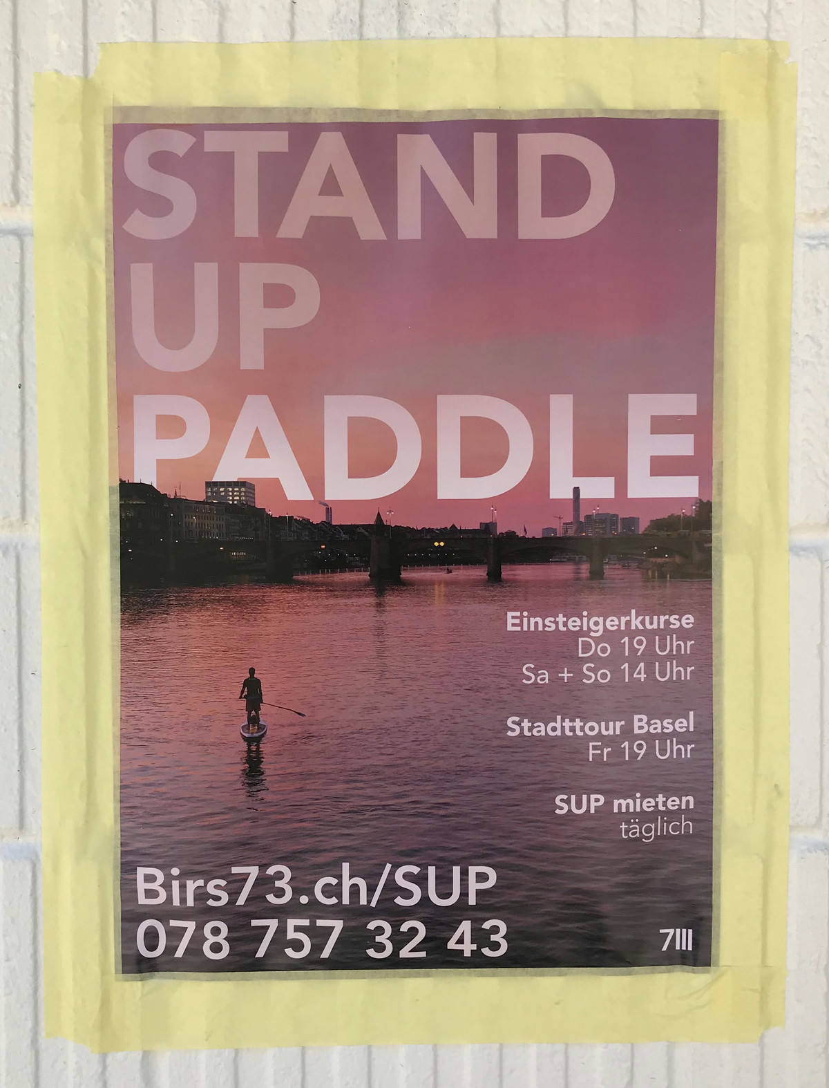 A poster advertising standup paddling in Basel